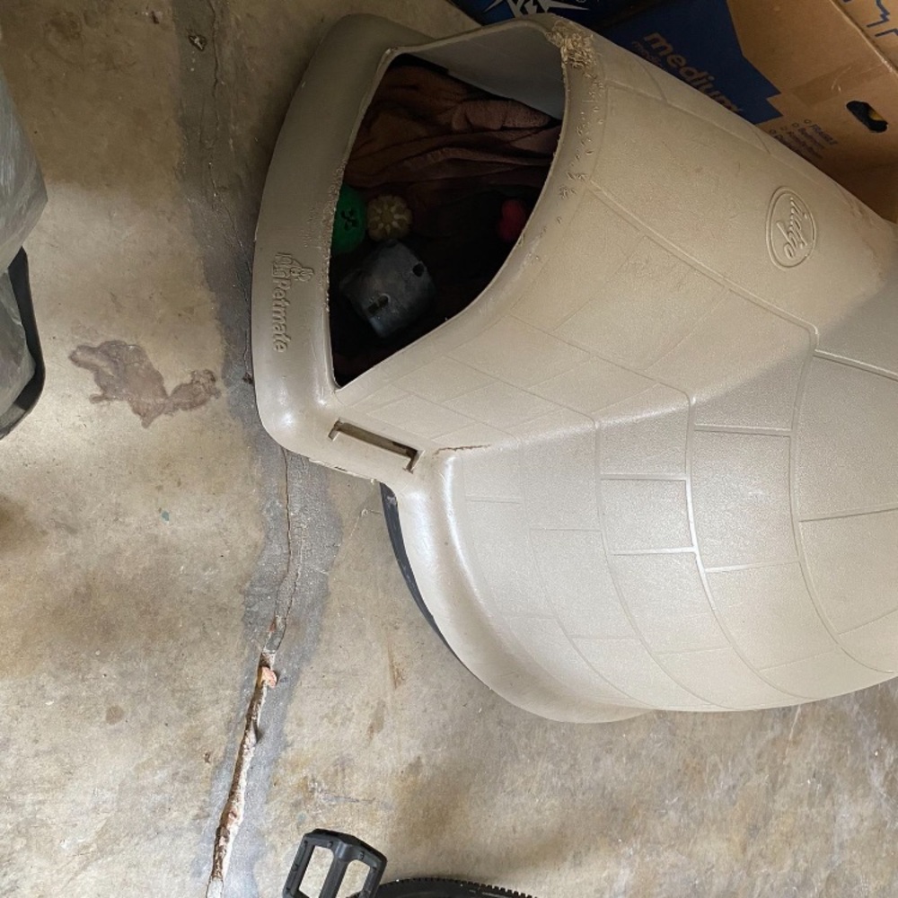 Indigo dog house lightly used has some bite marks on it off tan color.